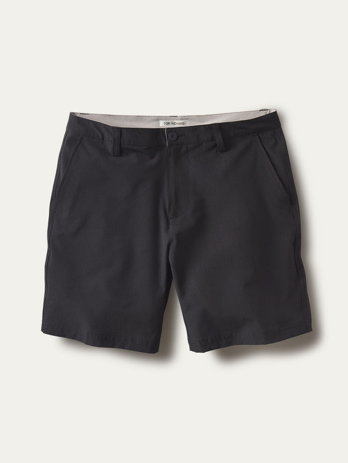 Black solid mens shorts with belt loops, pockets, and button closure, front view (Images 1 & 2).