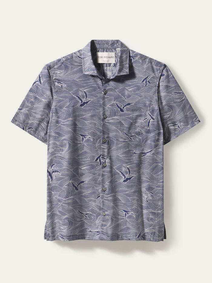 Blue and white wave-print Whale Season short-sleeve button-down shirt, front view.{{/AltText}}.