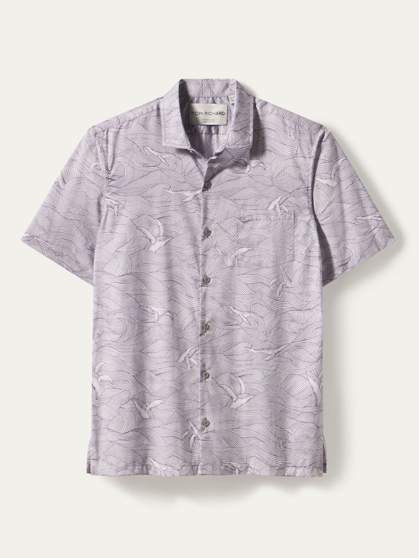 Light purple whale and wave-print short-sleeve Whale Season shirt, front view.{{/AltText}}.