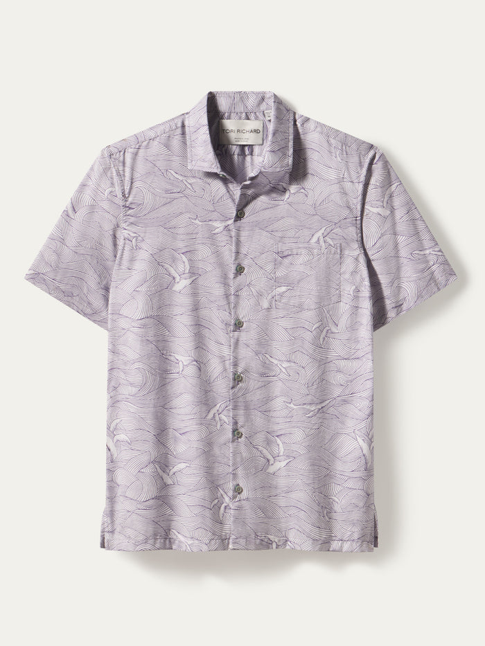 Light purple whale and wave-print short-sleeve Whale Season shirt, front view.{{/AltText}}.