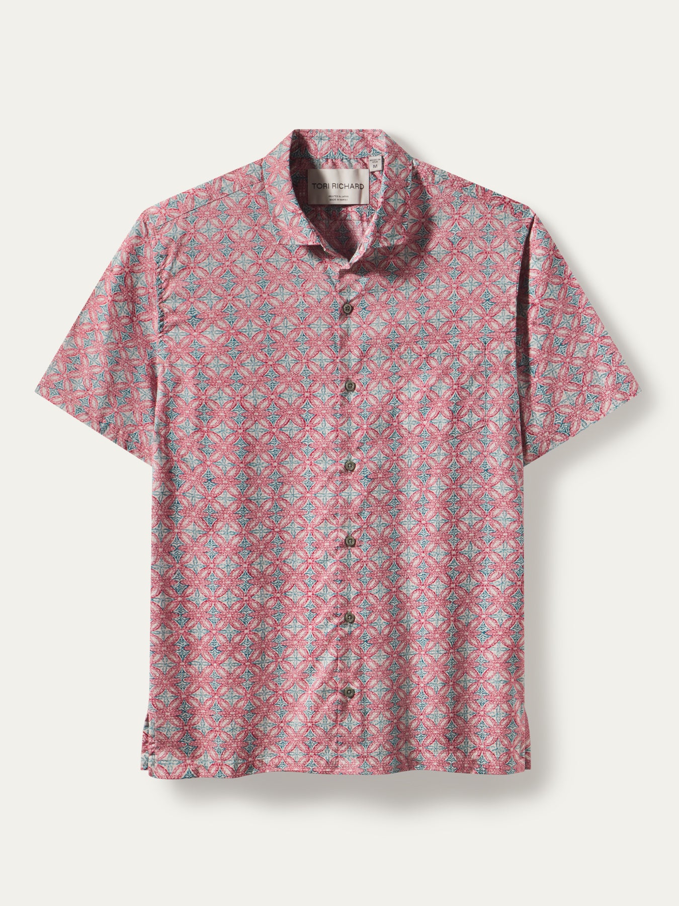 Pink, blue, and white geometric-print short-sleeve cotton shirt, shown in front view.