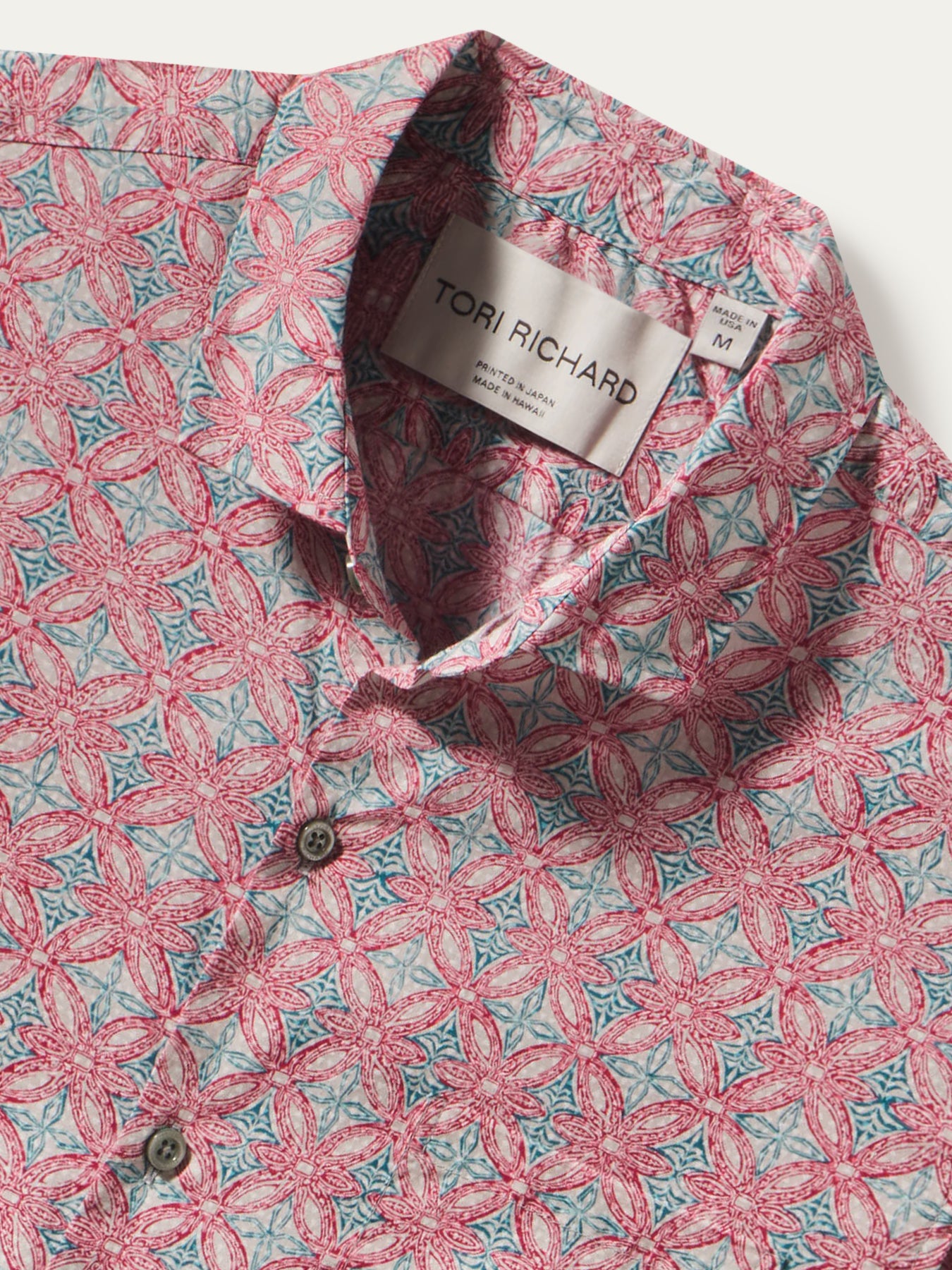 Pink and teal floral-print cotton lawn shirt, front view.