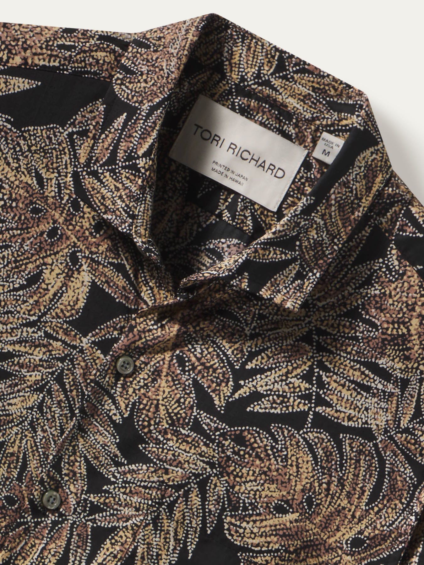 Black dotted leaf-print cotton lawn shirt, shown in front view.