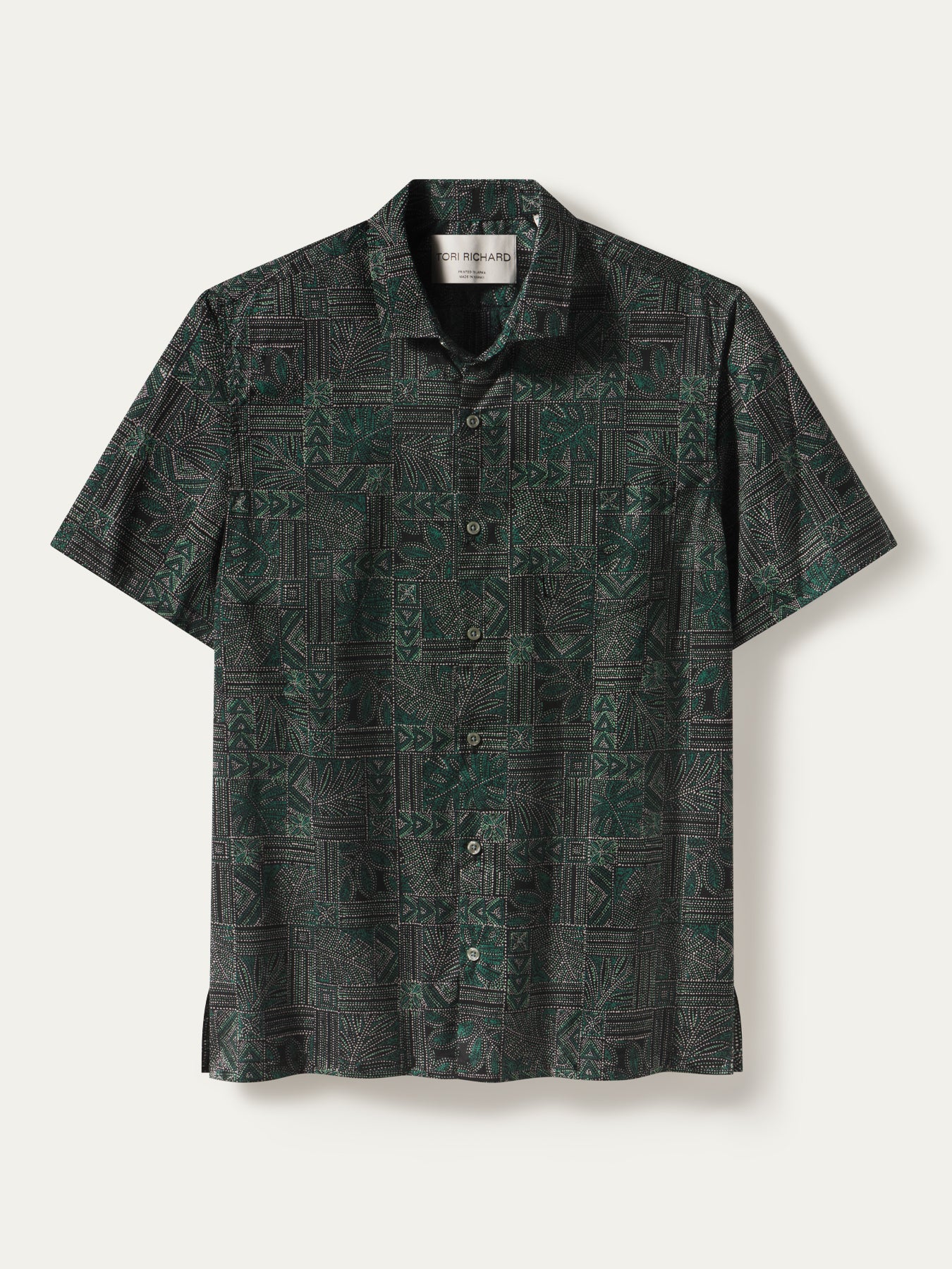 Dark green and black geometric-print short-sleeve button-up shirt, front view (Images 1 & 2).