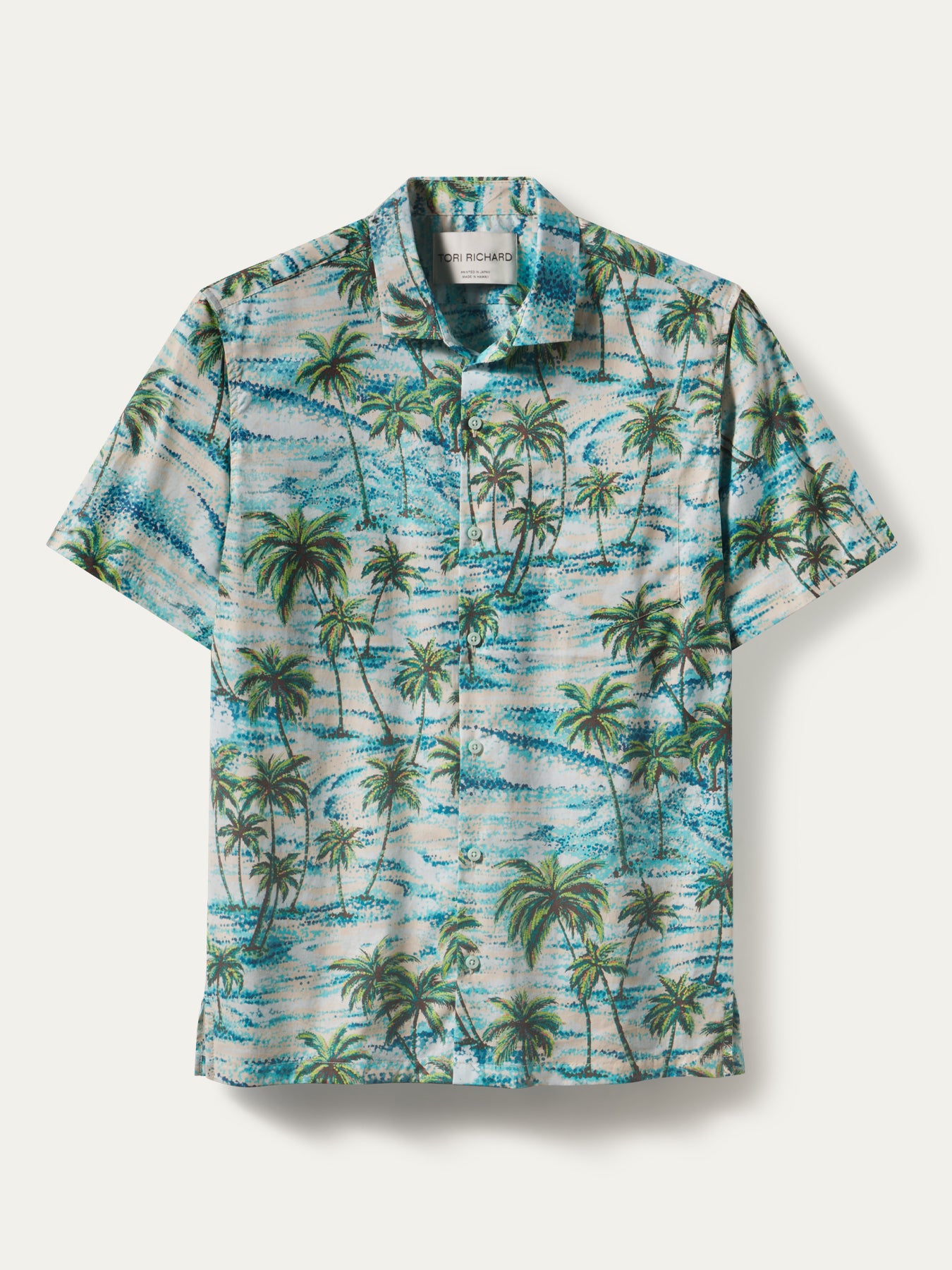 Blue and green tropical palm-print short-sleeve cotton shirt, Japanese-inspired design, front view.
