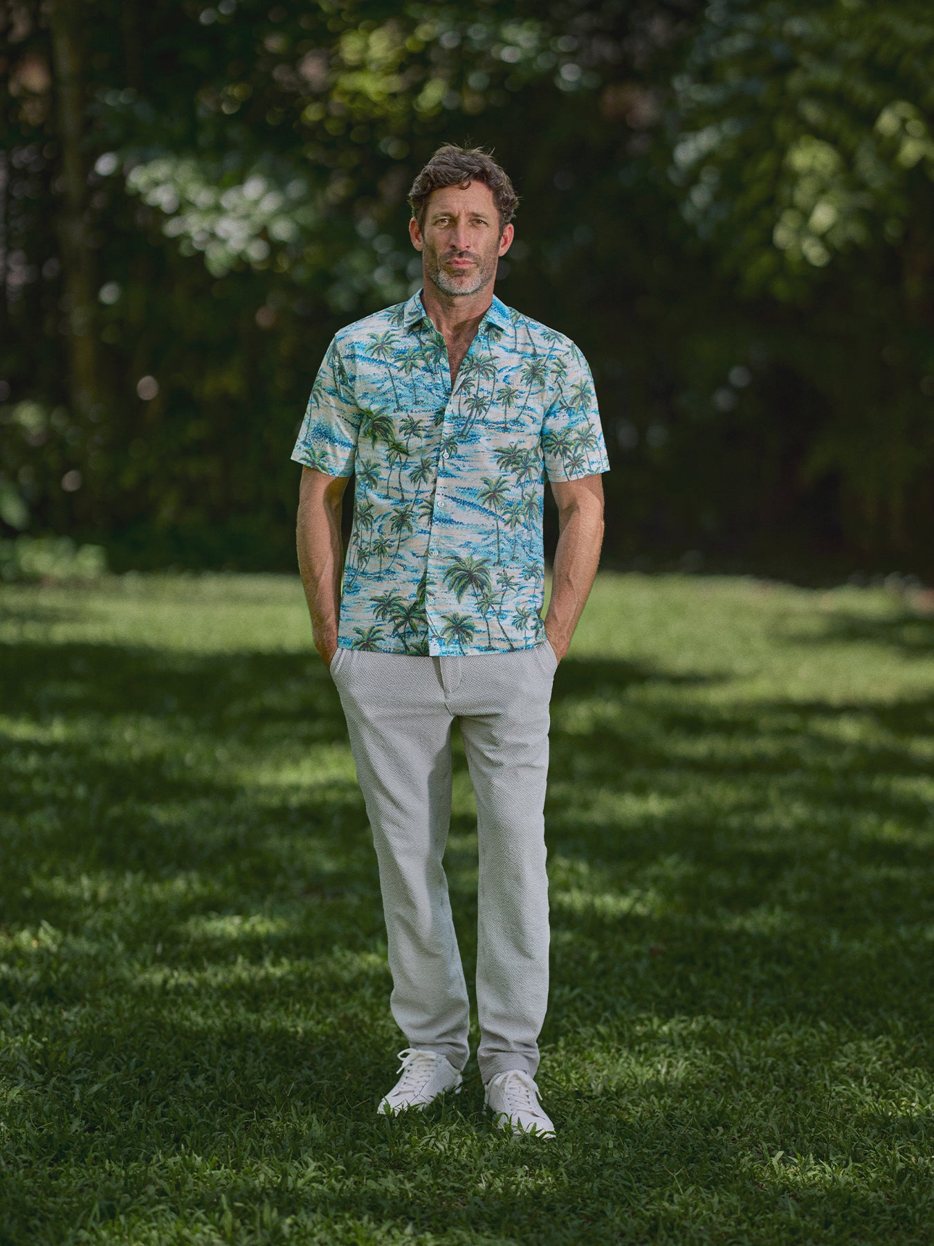 Blue and green palm tree print Shore View short-sleeve shirt, front view.{{/AltText}}.