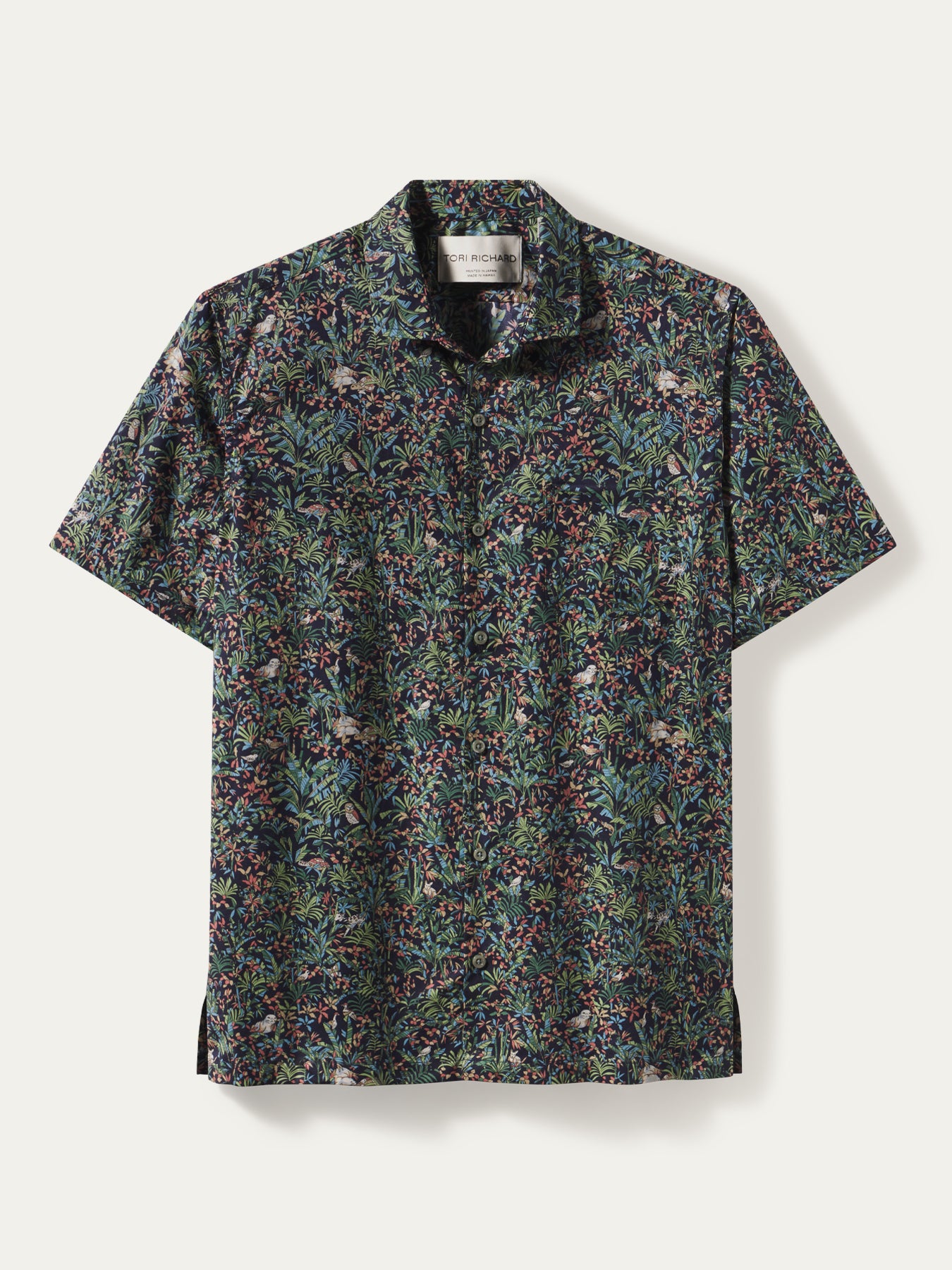 Dark multicolor leaf and floral print cotton Hawaiian shirt, flat lay on white background (Image 1 & 2).