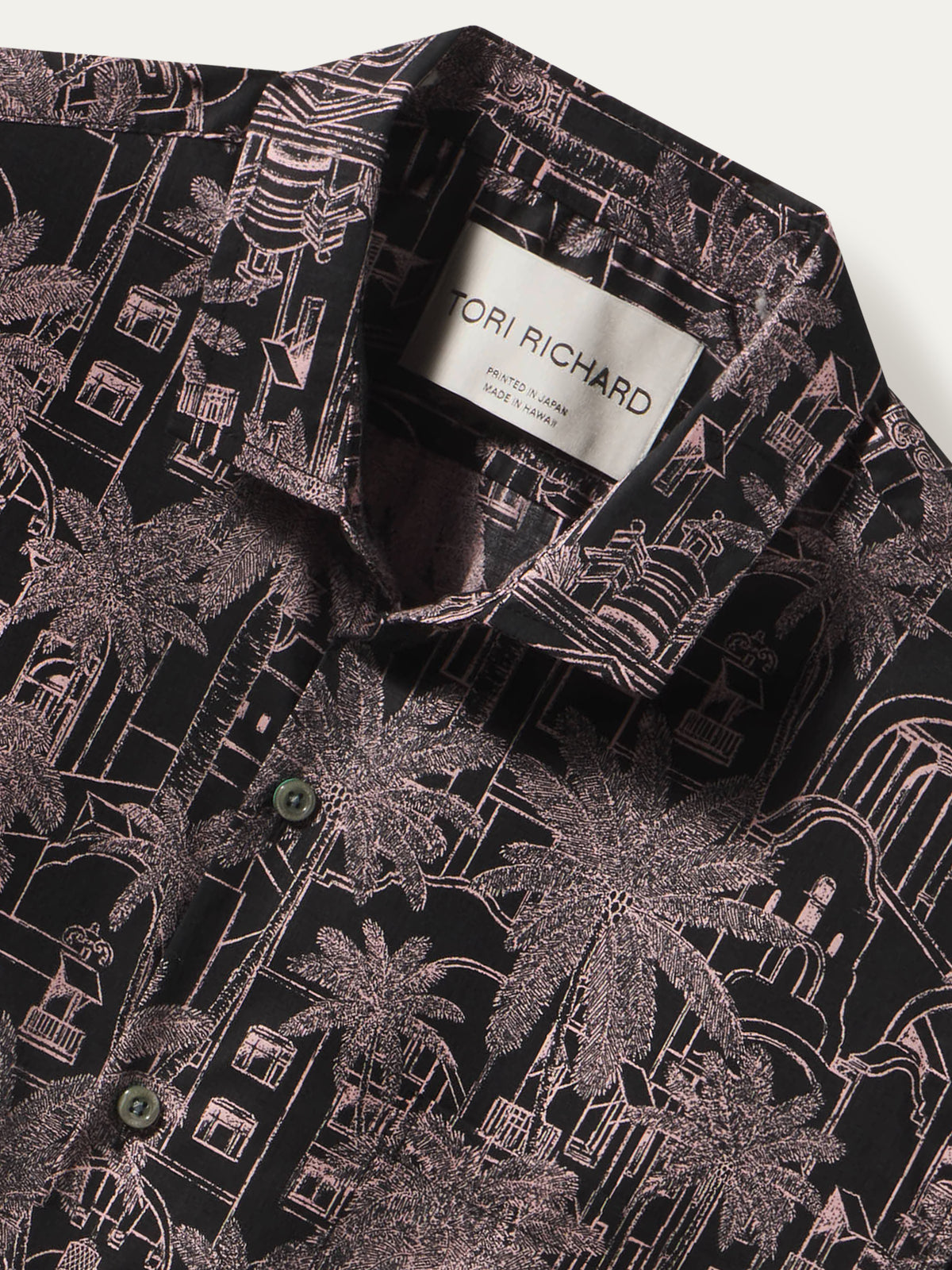 Black shirt with pink tropical print, button-up, short sleeves, collar, Tori Richard label visible in both images.