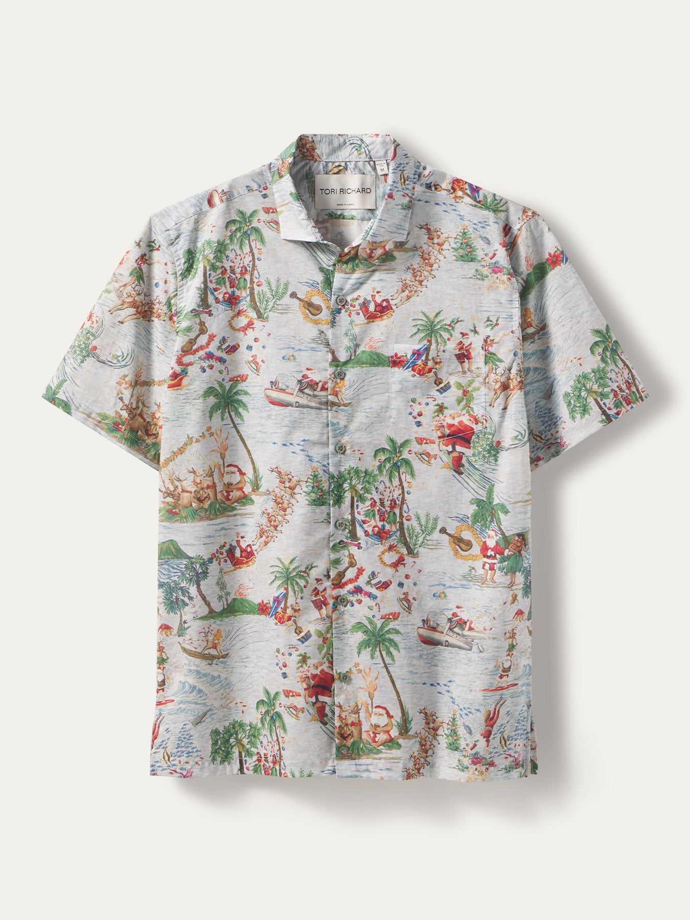 White cotton short-sleeve shirt with palm tree and island print, front view shown in both images.