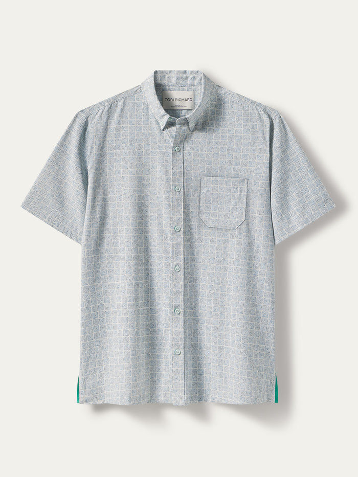 Light blue grid-pattern short-sleeve shirt with chest pocket, flat lay view (shown in Images 1 and 2).