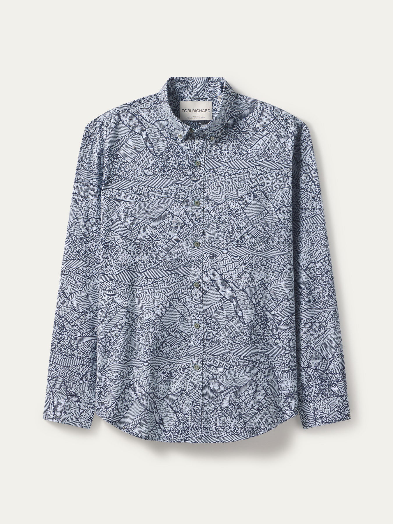 Blue long-sleeve shirt with white and navy mountain pattern, laid flat against white background{{/AltText}}.