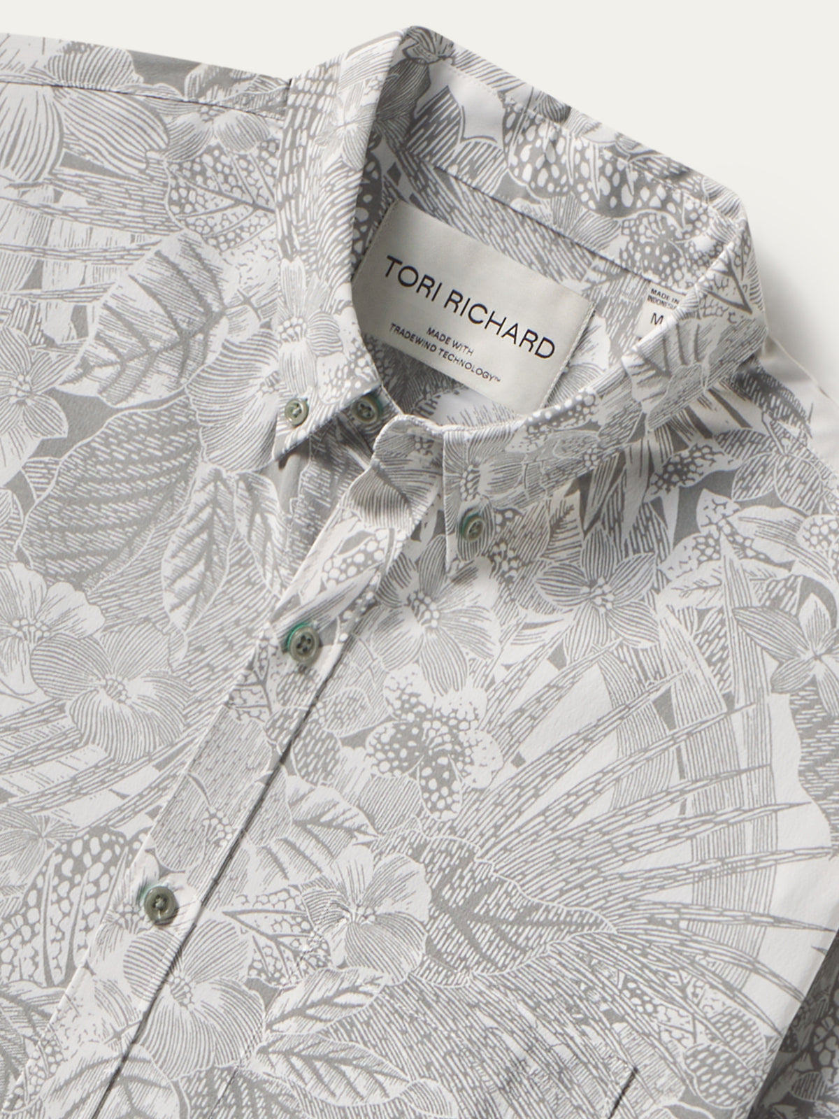 Gray and white tropical leaf-print long-sleeve shirt, Tori Richard label, front view shown in both images.