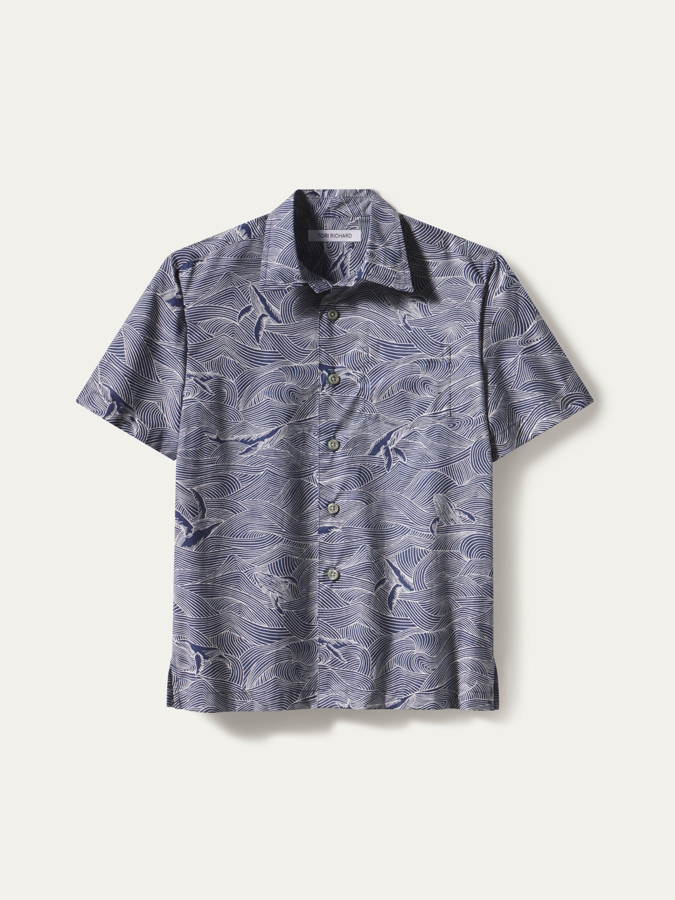 Blue and white whale-print Whale Season boy’s cotton lawn button-down shirt, front view{{/AltText}}.