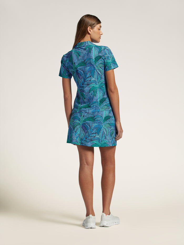 Black Line Dance print skort, back view, shown on woman with white shoes or sneakers.