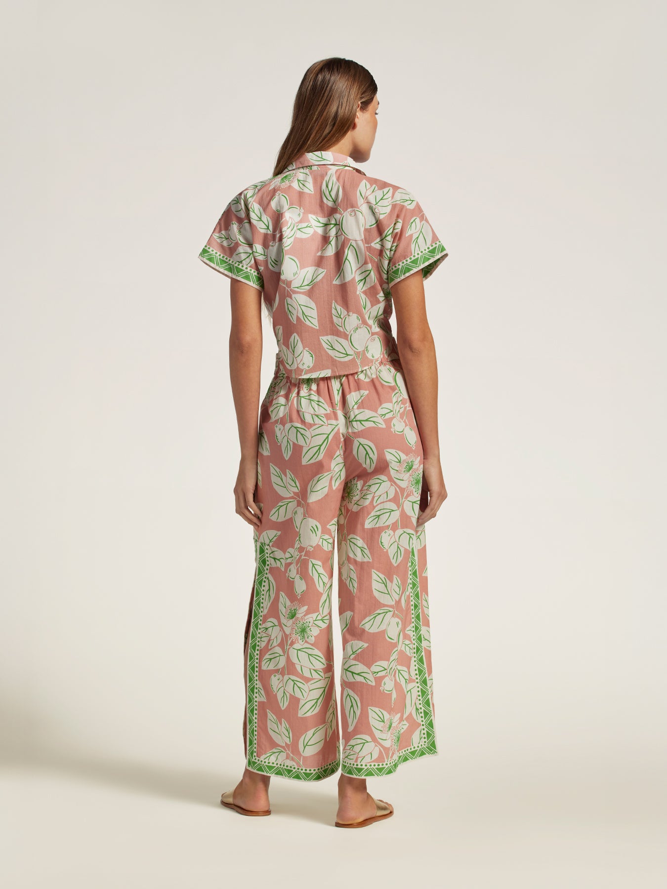 Pink and green leaf-print cotton voile pull-on pants, rear view.