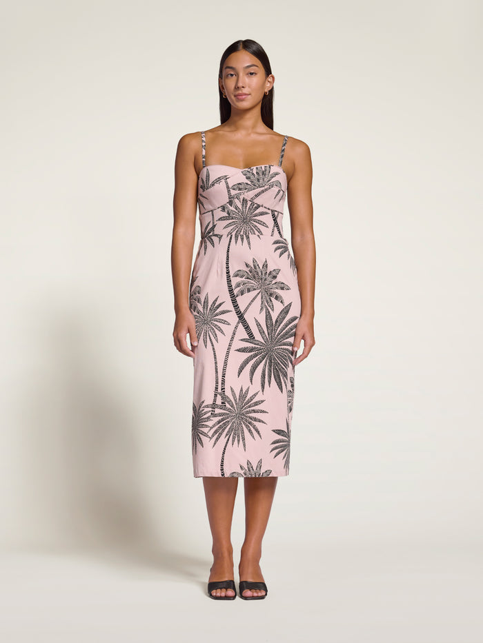 White coconut palm-print sleeveless dress with spaghetti straps, front view.
