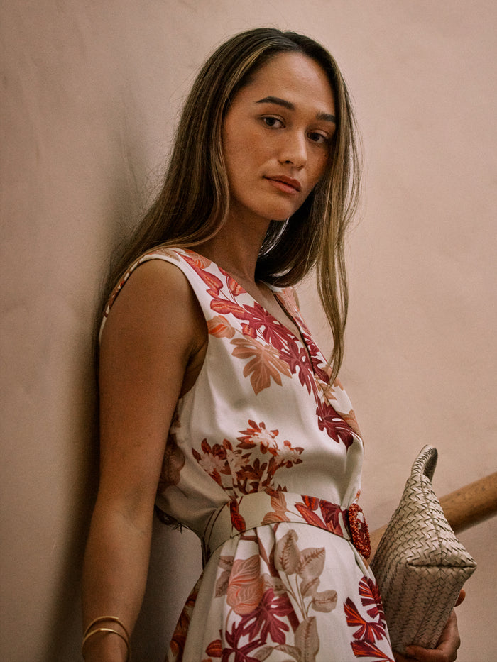 White and red floral-print Golden Hour Linnea tent dress with a V-neckline and waist belt.{{/AltText}}.