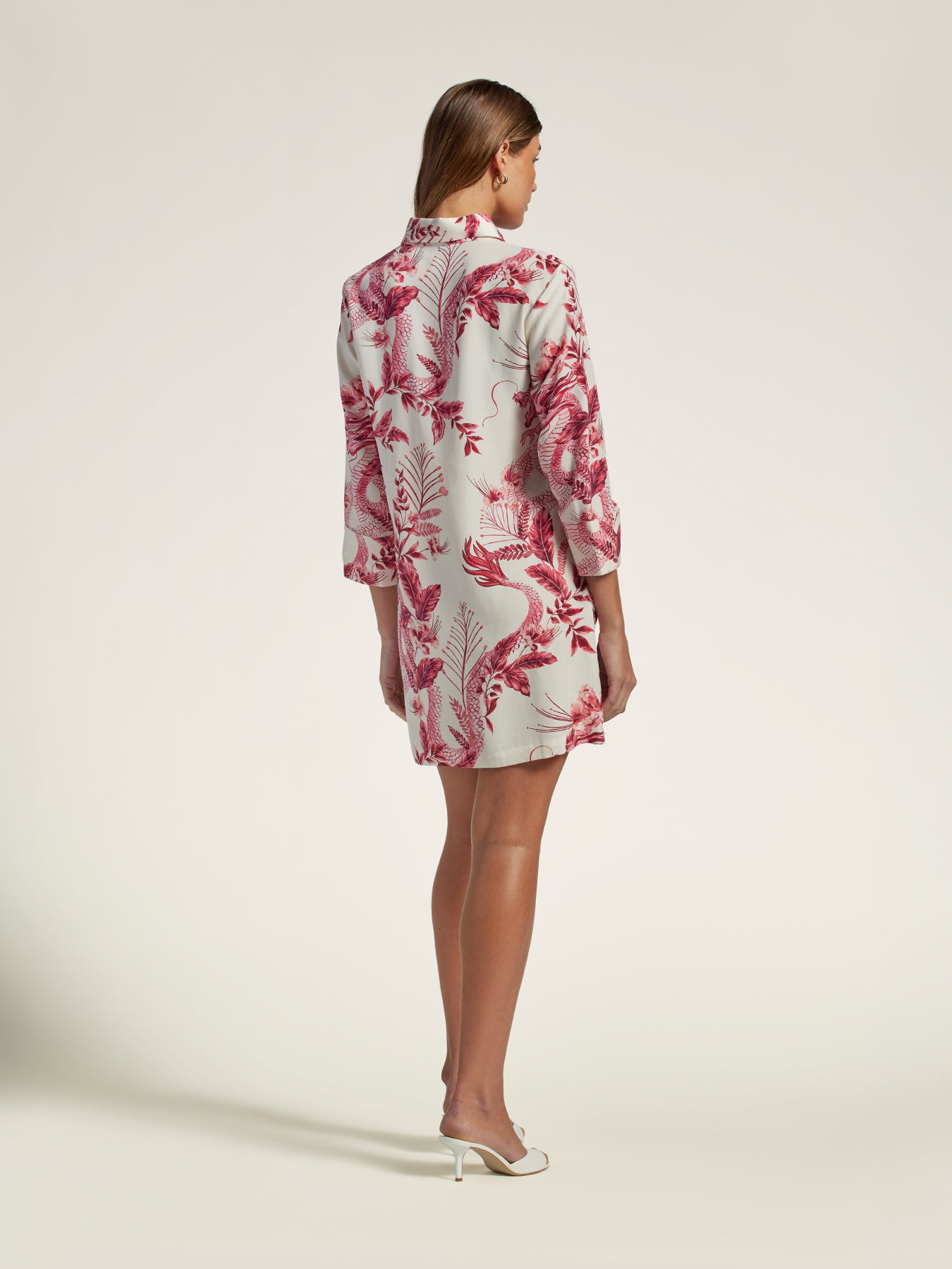 Image 1: Green solid three-quarter sleeve dress, back view Image 2: Green solid three-quarter sleeve dress, back view.