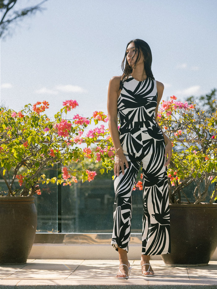 Black and white leaf-print Migration Jessamy jumpsuit, full body front view.{{/AltText}}.