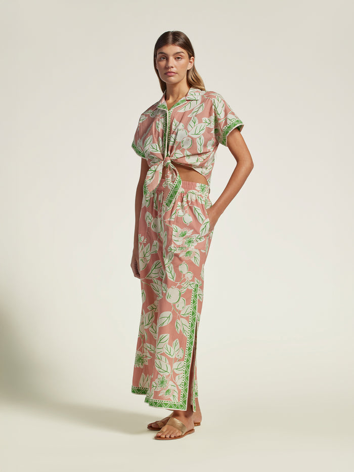 Green and pink floral-print Manon top with wide-leg pants, barefoot, front view (Images 1 & 2).