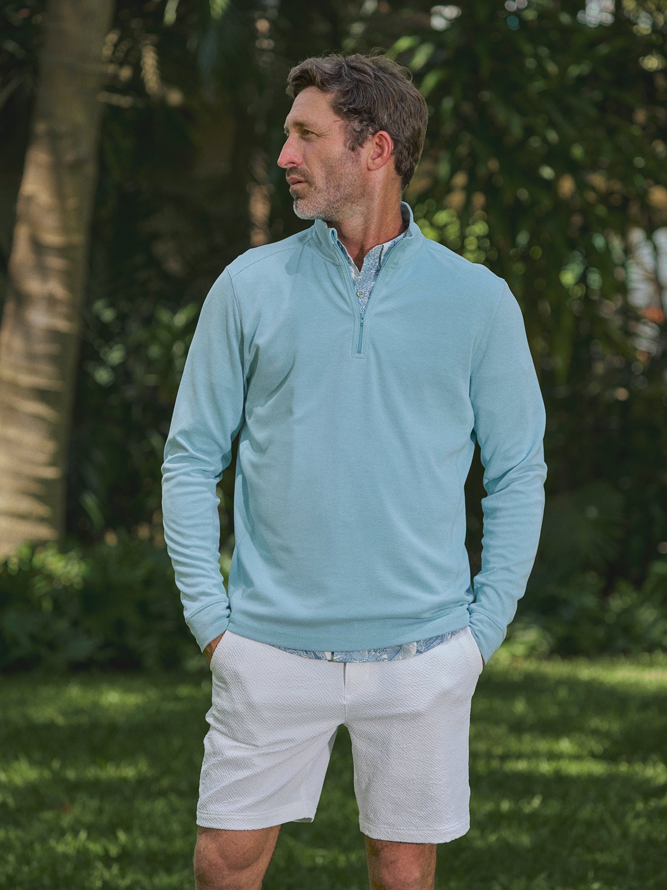 Light blue Tradewind Technology® long-sleeve Coastline quarter-zip shirt, front view.{{/AltText}}.