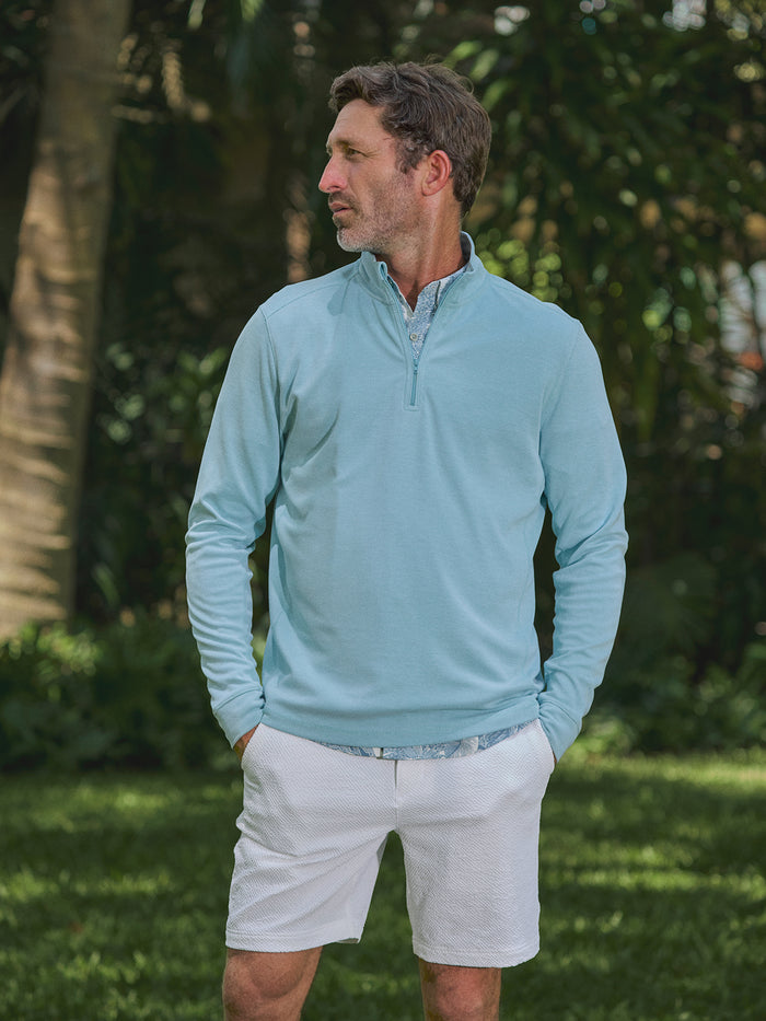 Light blue Tradewind Technology® long-sleeve Coastline quarter-zip shirt, front view.{{/AltText}}.