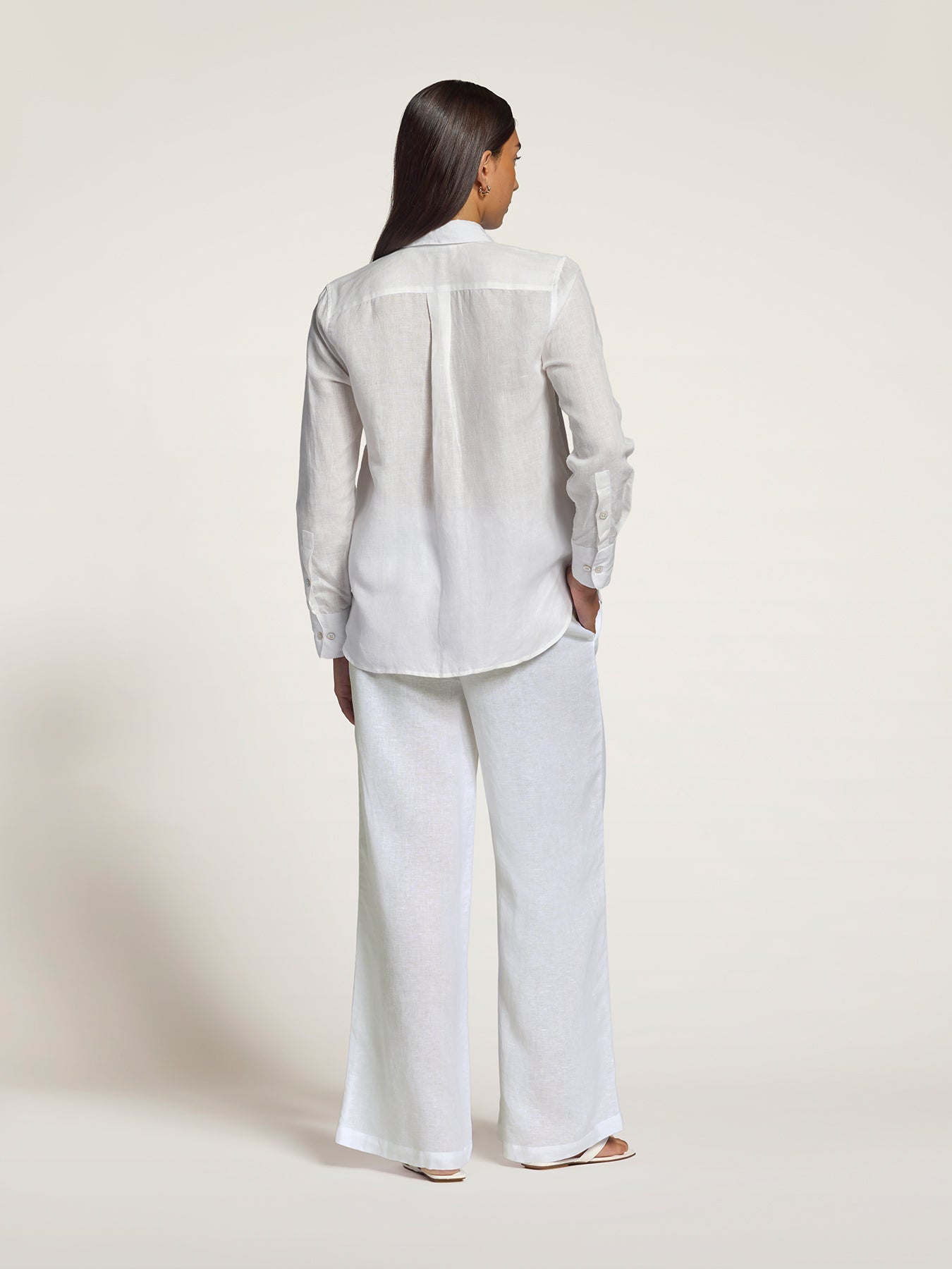 White solid linen long-sleeve top, back view in both images.
