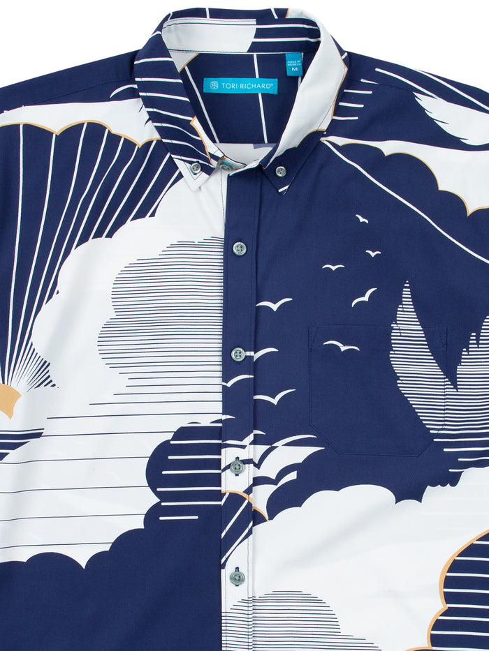 Navy/white cloud, bird, and sun-print performance shirt, front and back views.